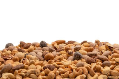 Lezzetli tuzlu fındık karışımı. Bir grup badem, fıstık, ceviz, macadamia, kaju..