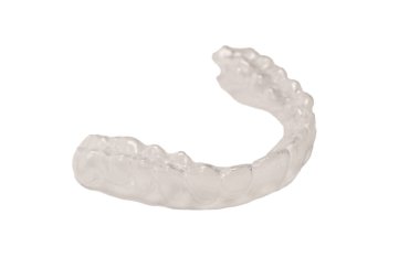 Transparent mouth guard isolated on a white background.  clipart