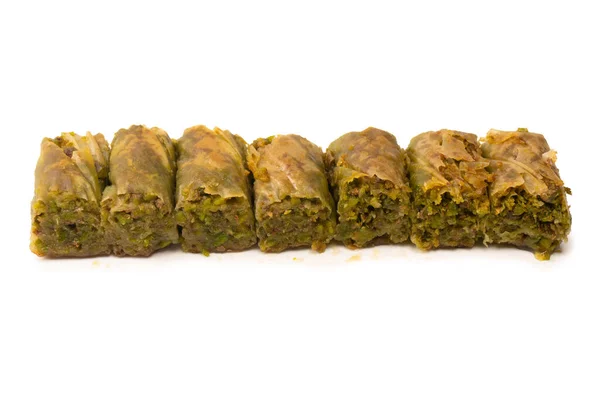 stock image Turkish pistachio baklava isolated on a white background. 