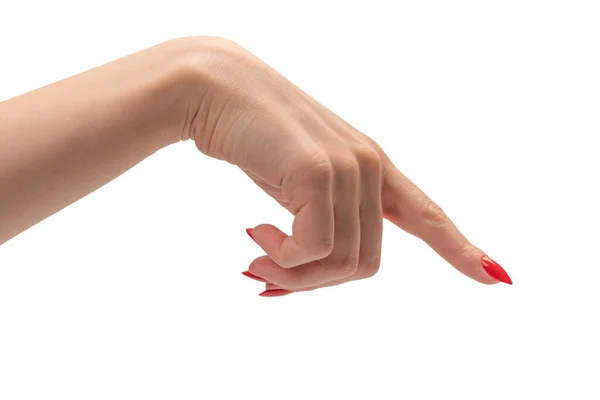 薄い肌と赤い爪を持つ女性の手の閉鎖を指すか 白い背景に隔離されたタッチ — ストック写真