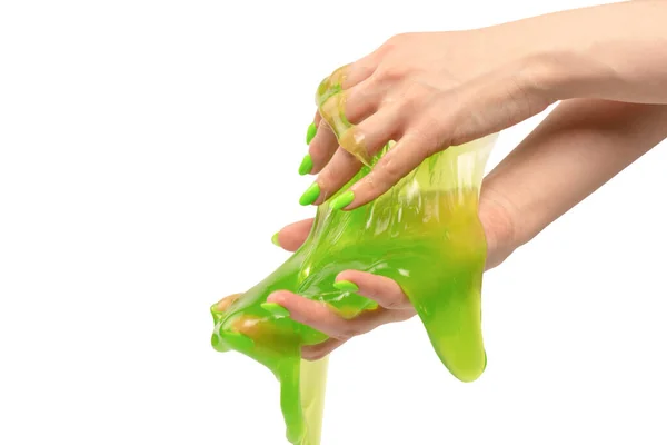 Groen Slijm Speelgoed Vrouw Hand Met Groene Nagels Geïsoleerd Een — Stockfoto