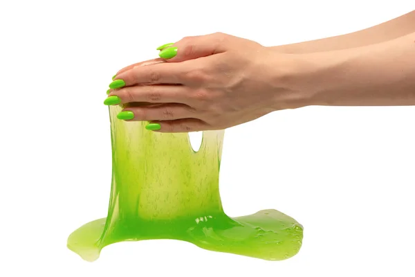 Πράσινο Slime Παιχνίδι Στο Χέρι Γυναίκα Πράσινα Νύχια Απομονώνονται Λευκό — Φωτογραφία Αρχείου