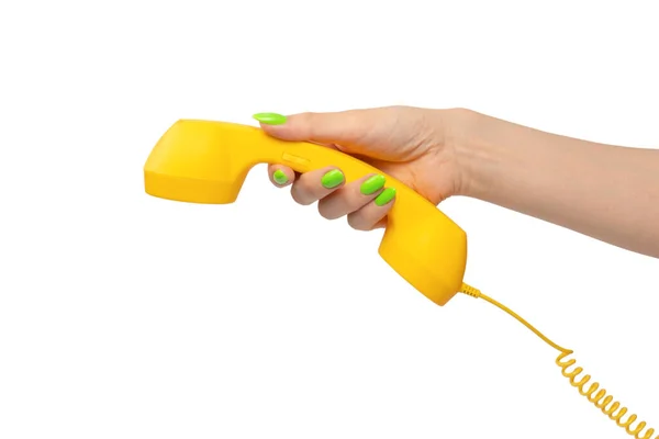 Gele Handset Vrouw Hand Met Groene Nagels Geïsoleerd Een Witte — Stockfoto