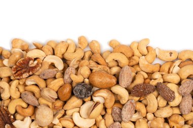 Lezzetli tuzlu fındık karışımı. Bir grup badem, fıstık, ceviz, macadamia, kaju..