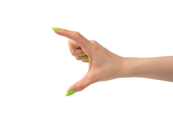 Mão Uma Mulher Com Naols Verdes Segurar Algum Objeto Minúsculo — Fotografia de Stock