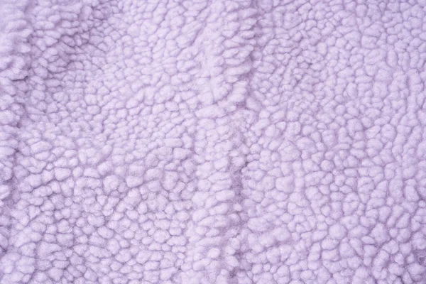 Purple fur texture as a background. Top view. 