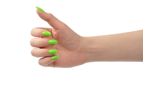 Mão Uma Mulher Com Naols Verdes Segurar Algum Objeto Minúsculo — Fotografia de Stock