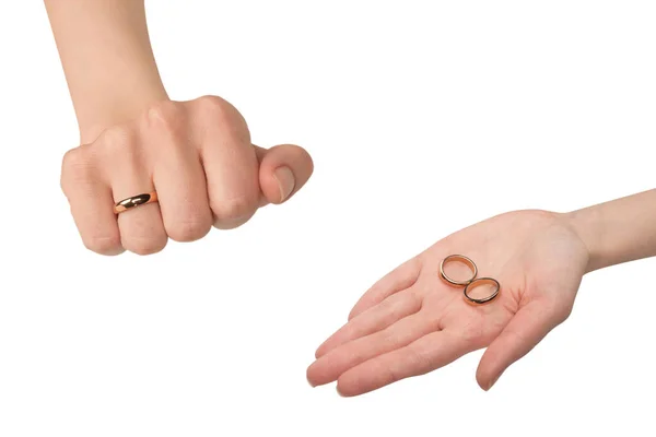 Δύο Χρυσά Δαχτυλίδια Ένα Γυναικείο Χέρι Απομονωμένα Λευκό Φόντο Έννοια — Φωτογραφία Αρχείου