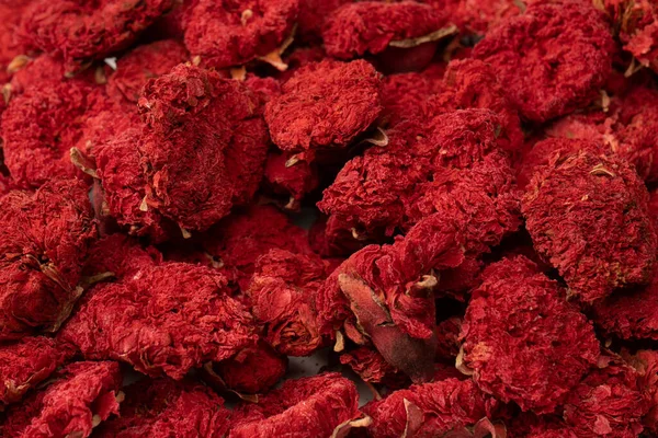 stock image Dried pomegranate flower as a background. Top view.