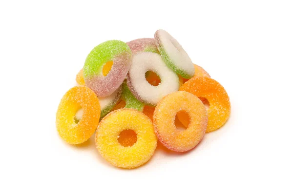 在白色的背景上分离出不同种类的糖果 顶部视图 果冻糖 — 图库照片