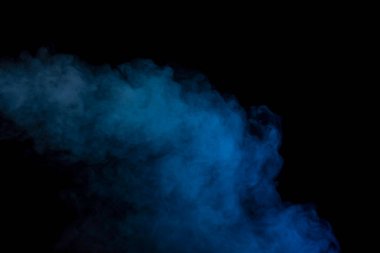 Siyah arka planda mavi ve sarı buhar. Boşluğu kopyala.