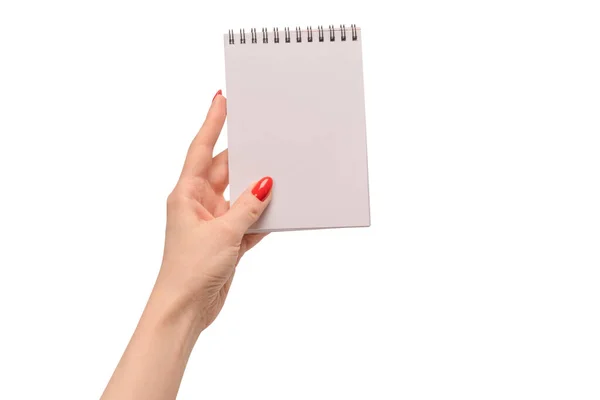 Ein Notizbuch Mit Leerem Weißen Papier Frauenhänden Mit Roten Nägeln — Stockfoto