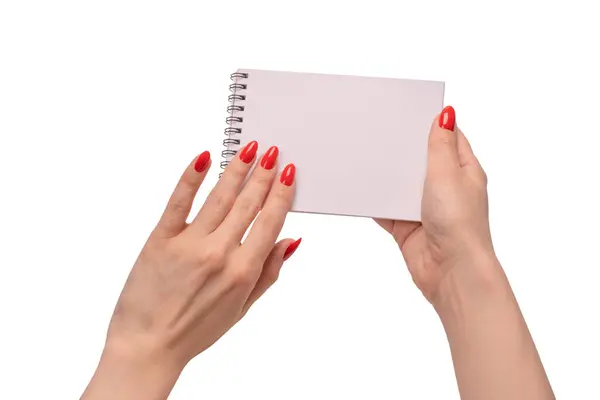 Cuaderno Con Papel Blanco Vacío Manos Mujer Con Uñas Rojas — Foto de Stock