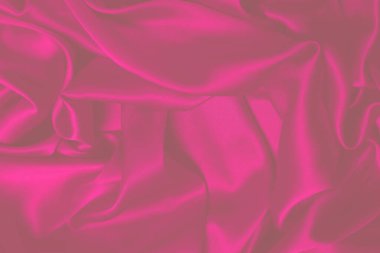 Zengin ve lüks kırmızı ipek kumaş dokusu. Üst görünüm.