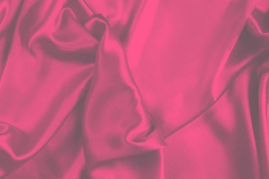 Kırmızı ipek ya da saten lüks kumaş dokusu soyut bir arka plan olarak kullanılabilir. Üst görünüm.