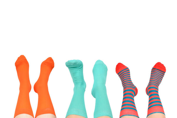 Orange socks on woman foot isolated on white background.