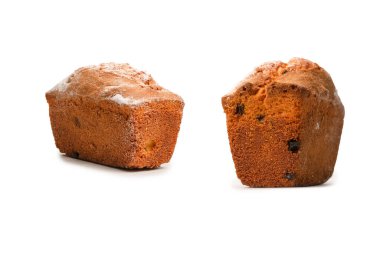 A cupcake with raisins isoalted on a white background. Muffin. 