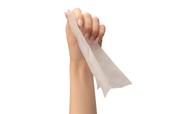 Wet wipe in a woman hand isolated on a white background. Washing hands isolated.