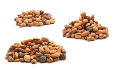 Lezzetli tuzlu fındık karışımı. Bir grup badem, fıstık, ceviz, macadamia, kaju..