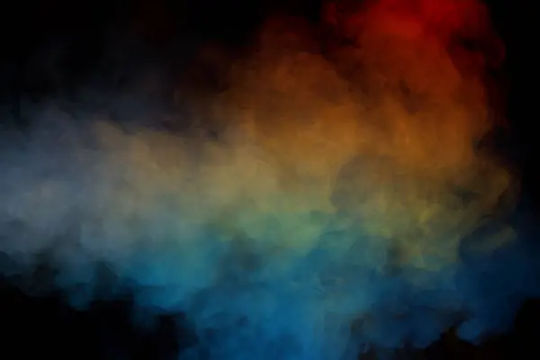 stock image Blue and yellow steam on a black background. Copy space.