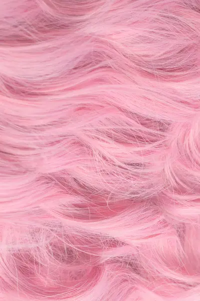 Pink beautiful wavy hair pattern. Top view.