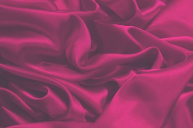 Zengin ve lüks kırmızı ipek kumaş dokusu. Üst görünüm.