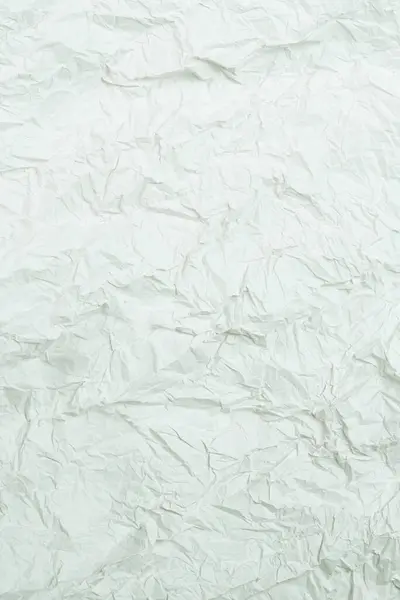 Crumpled white paper background. Top view.