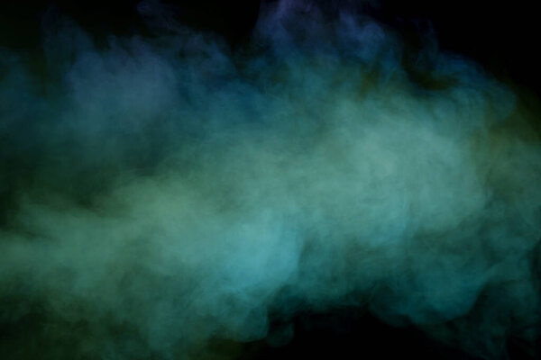 Blue and purple steam on a black background. Copy space.