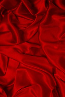 Zengin ve lüks kırmızı ipek kumaş dokusu. Üst görünüm.