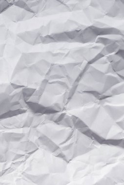 Buruşmuş beyaz kağıt arka plan. Üst görünüm. 