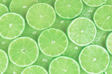 Arkaplan olarak taze limon dilimleri. 