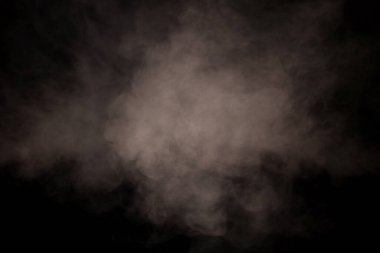 Siyah arka planda beyaz buhar. Boşluğu kopyala.