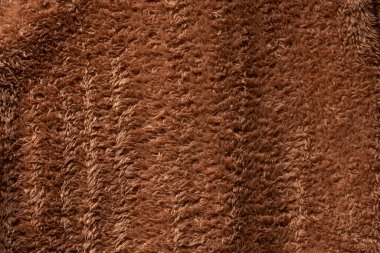 Arkaplan olarak kahverengi sahte kürk dokusu. 