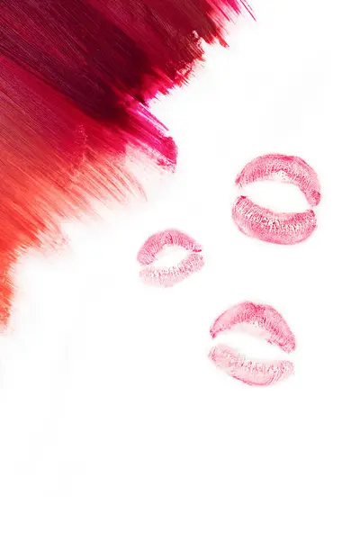 From light to deep colour lipstick texture.  Isolated on white. Copy space.