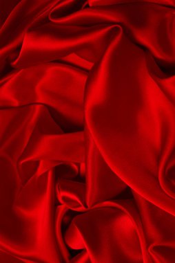 Zengin ve lüks kırmızı ipek kumaş dokusu. Üst görünüm.