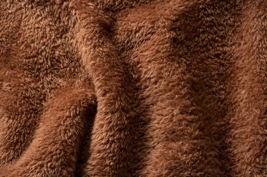 Arkaplan olarak kahverengi sahte kürk dokusu. 