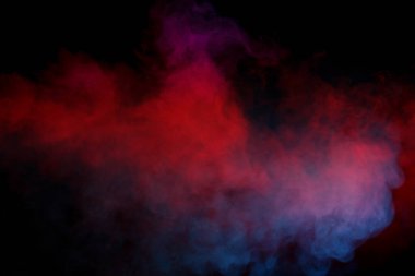 Siyah arka planda mavi ve sarı buhar. Boşluğu kopyala.