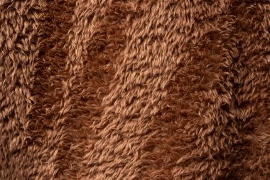 Arkaplan olarak kahverengi sahte kürk dokusu. 