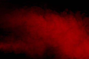 Siyah arka planda turuncu ve kırmızı buhar. Boşluğu kopyala.