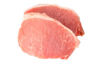 Beyaz arka planda çiğ domuz parçaları. Üst görünüm. 