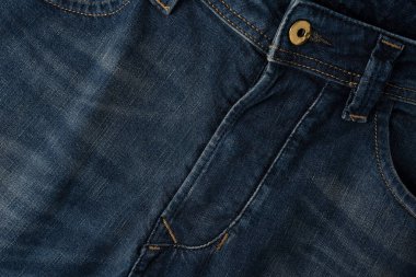 Arka plan olarak kot pantolon kumaşı. Üst görünüm. 