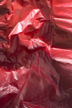 Plastik kırmızı arka plan. Üst görünüm.