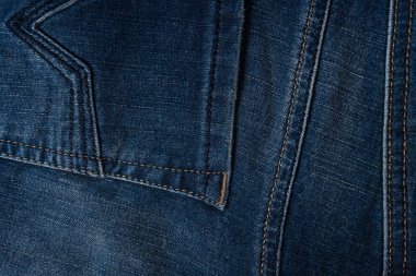 Arka plan olarak kot pantolon kumaşı. Üst görünüm. 