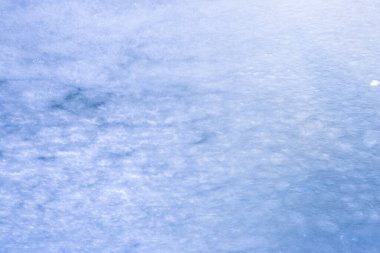 Buzun doğal dokusu, arka plan olarak donmuş göl..