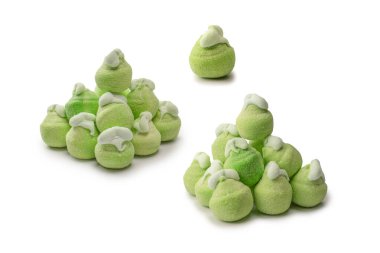 Green marshmallow candy isolated on a white background. 