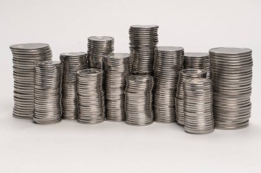 Pile of coins isolated on a white background. Banking and money.  clipart