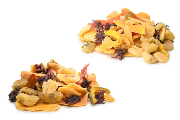 stock image Mix of dried exotic fruit, mangos,slices of pineapples, passion fruit, papaya. Vegetarian dessert.  