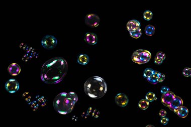 Sabun köpükleri siyah arka planda izole edilmiş. Boşluğu kopyala. 