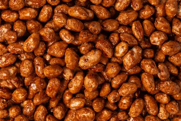 stock image Tasty sweet roasted peanuts as a background. 