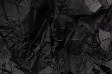 Soyut siyah kağıt dokusu arkaplanı. Üst Manzara. Boşluğu kopyala. 